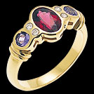C882 Oval Garnet and Round Tanzanite Diamond Yellow Gold Ring